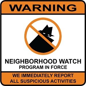 warning sign about neighborhood watch program