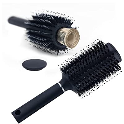 A Travah diversion hairbrush in black