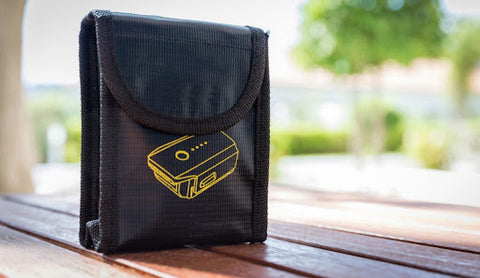 A envelope style document bag with a yellow logo on the front