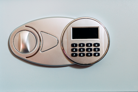 A digital silver safe showing the lock and keypad