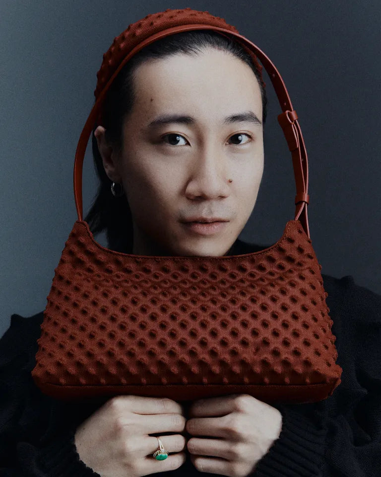 Designer Chet Lo, with the Spike Textured Shoulder Bag ($159).