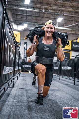Superstar Athlete Lisa Wawrzynowski pushes her limits lifting weights in MudGear mid-length shorts and compression socks