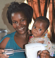 Woman with Mixer and Baby 