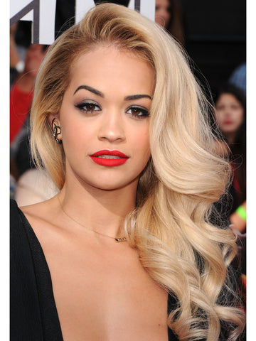 Rita Ora at a premiere with blonde sideswept hair