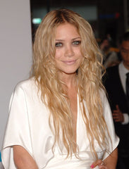 Olsen twin with long blonde wavy mermaid hair