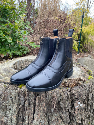 black ankle height boot on stump