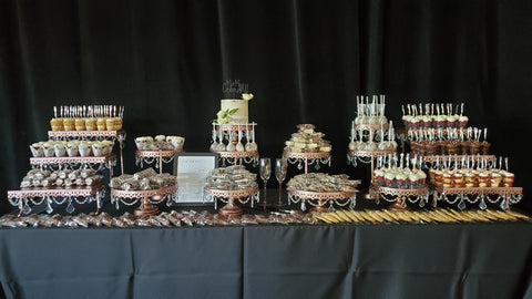 Desserts and display stands by silver rose bakery