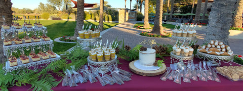 dessert table with wedding cake.