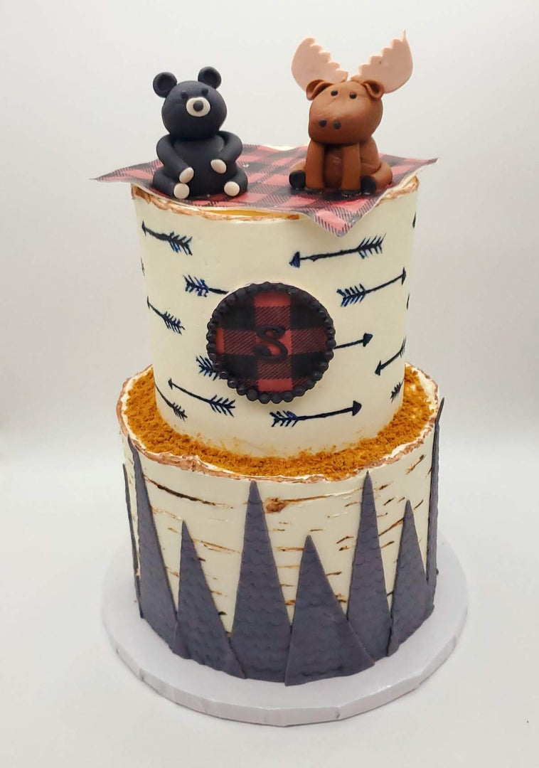 https://cdn.shopify.com/s/files/1/0366/0726/2860/t/13/assets/zooomy-1663107377woodland-custom-baby-birthday-cake_1080x1080.jpg?v=1663107378