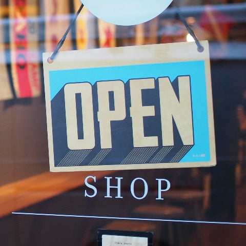 Shop open sign on door