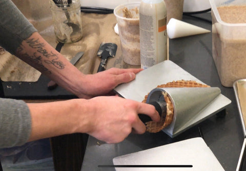 hand rolling waffle cones