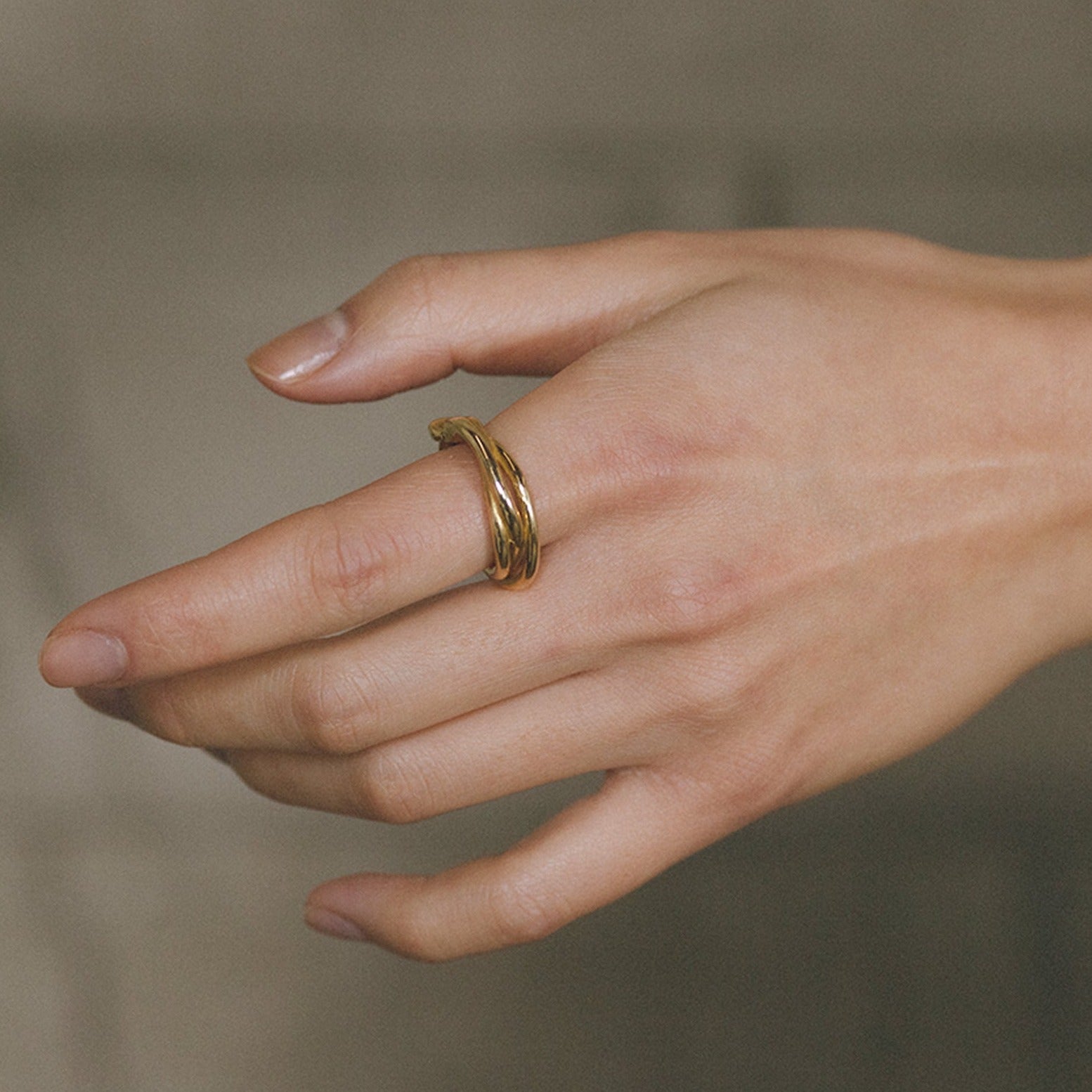 Faris bronze Tangle Ring on hand. Available at FAWN Toronto.