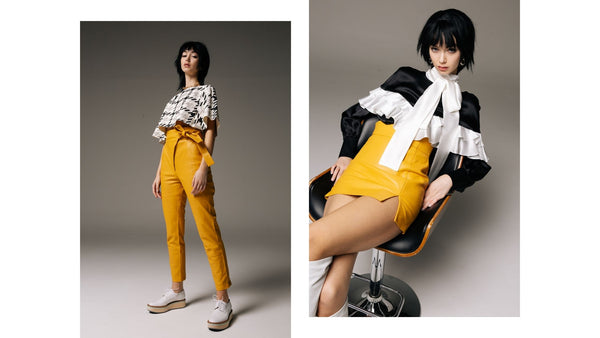 two-skiim-looks-one-model-wears-yellow-leather-trousers-and-black-and-white-leather-cape-top-the-second-model-wears-yellow-leather-mini-skirt-and-black-and-white-leather-top