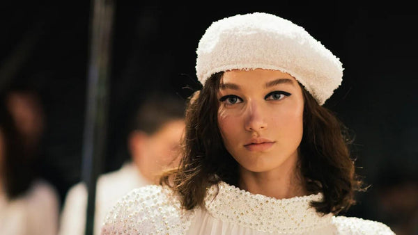 Channel-model-wears-white-beret-on-runway-show