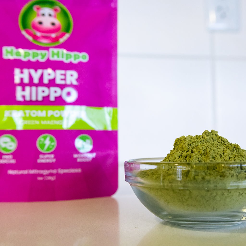 Photographic image depicting a 4oz packet of Happy Hippo Brand Green Maeng Da (Hyper Hippo) Kratom Powder.