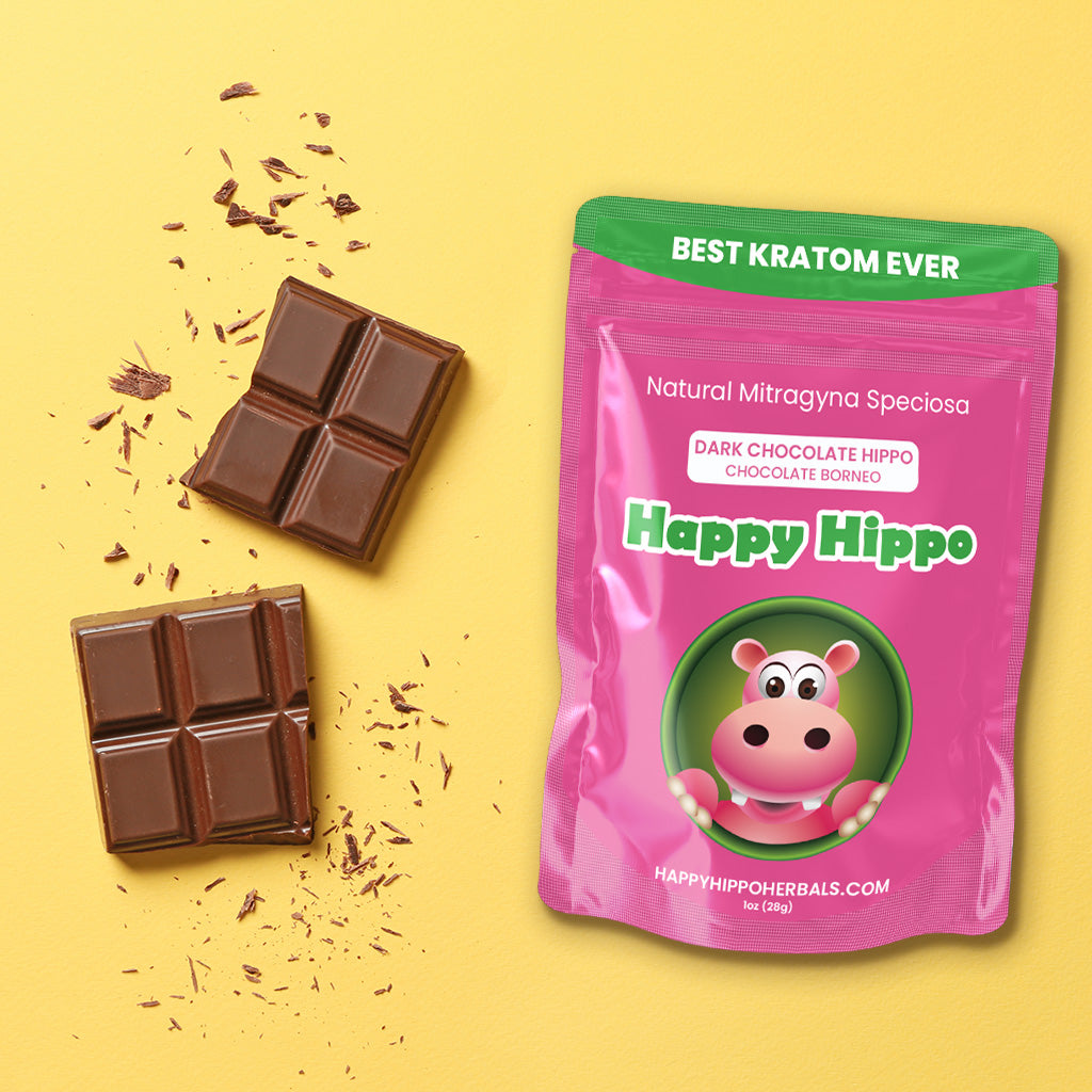 Photographic image depicting a 1oz packet of Happy Hippo Brand Chocolate Bentuangie Kratom Powder lying next to a broken chocolate bar - The chocolate bar is breaking in an energetic action
