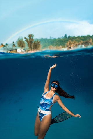 rainbow free diver underwater woman