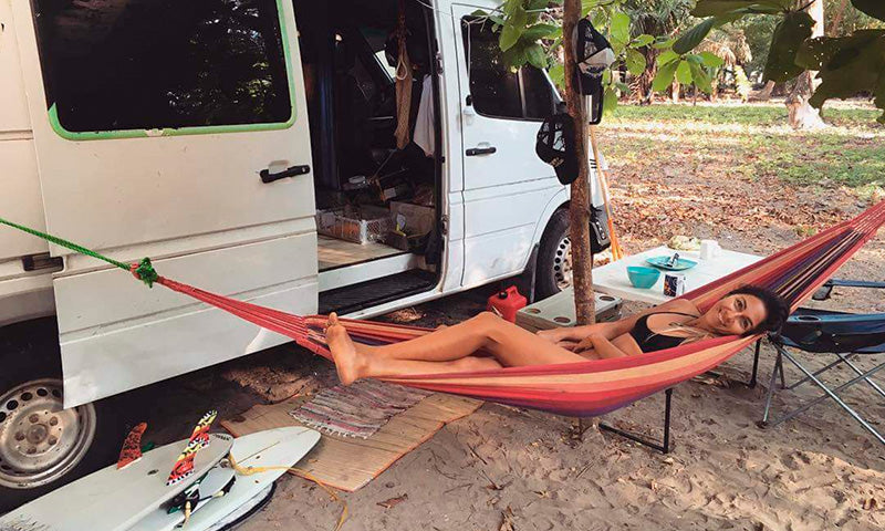 Tara chilling in a hammock in a van's life