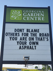 georgina garden centre road sign don't blame others for