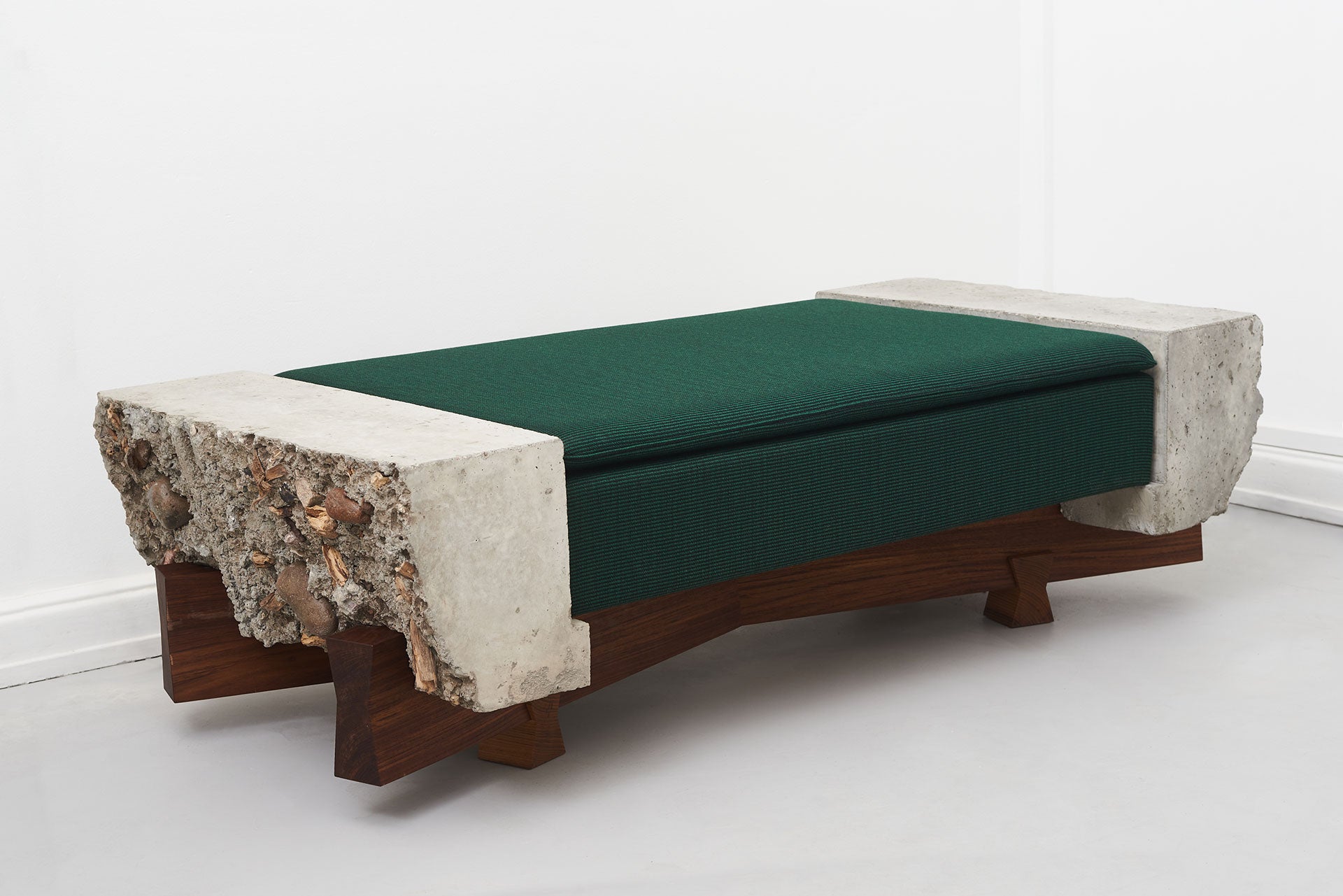 X-Bench Petit/ FOS, 2018/ Cast concrete with branches and stones, oiled wood base, seating upholstery/ Courtesy of FOS and Etage Projects