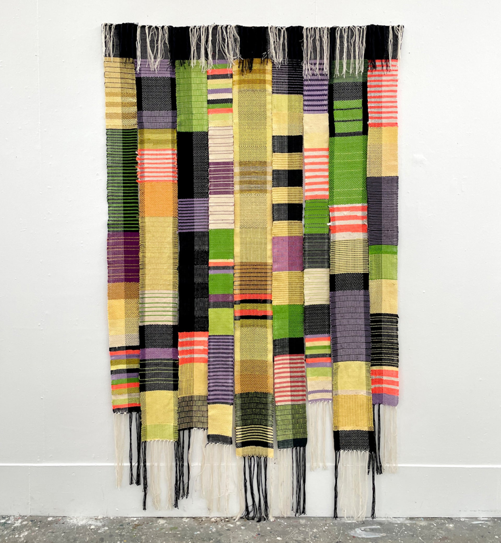 Home & Away by Paolo Arao, 2023. Hand-woven cotton, wool, acrylic, and synthetic fibers. Photo courtesy of Mindy Solomon Gallery and the artist