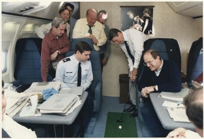 Ronald regana practicing putting on Air Force One
