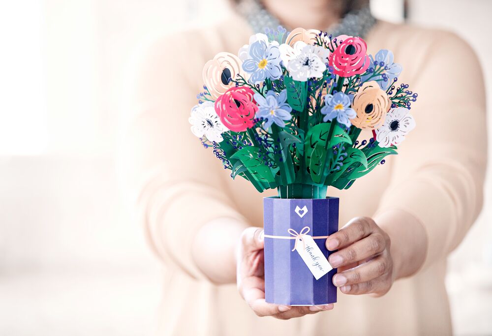 Woman Holding a Thank You Pop-Up Paper Flower Bouquet