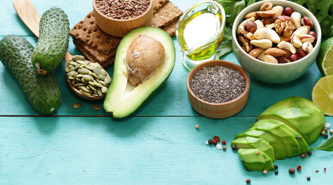 Image: Avocados, Seeds, Nuts and Veggies on a aqua wooden background.