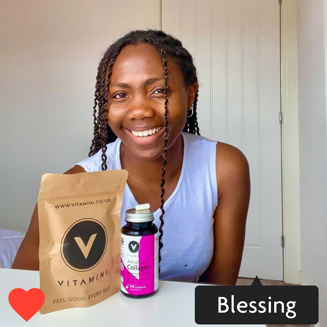 Instagram style image with Blessing tagged in. Blessing is sitting at a table with a Collagen Pot and Collagen Eco Pouch on the surface. Blessing has a massive smile and looks happy. 