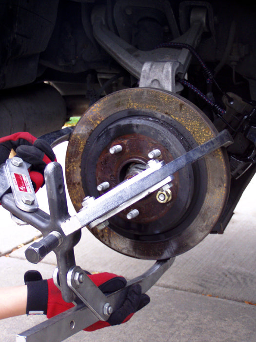 Using A Puller To Remove A Rusted On Brake Rotor Cartechbooks