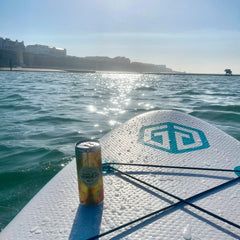 Paddle boarding with a canned wine on board