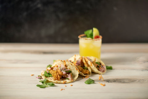 fried oyster tacos with a margarita