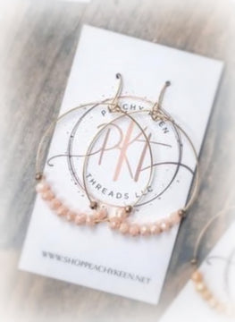 Pink beaded gold hoops