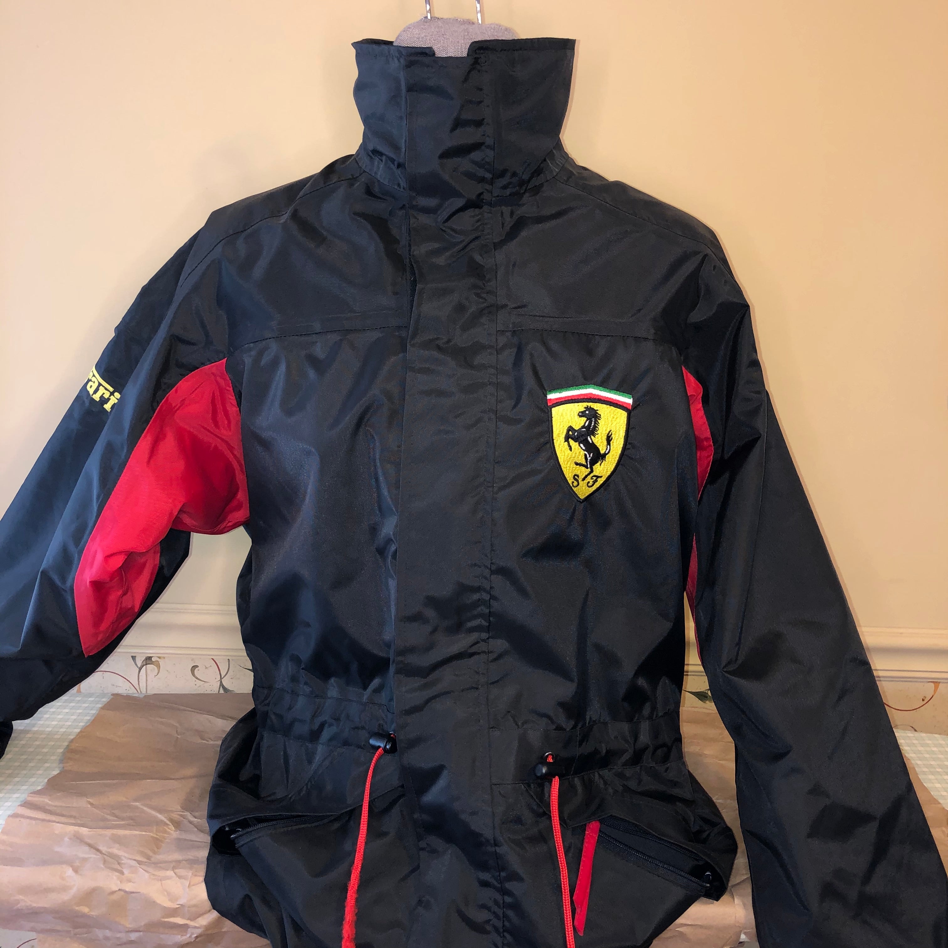 nice man sports ferrari jacket