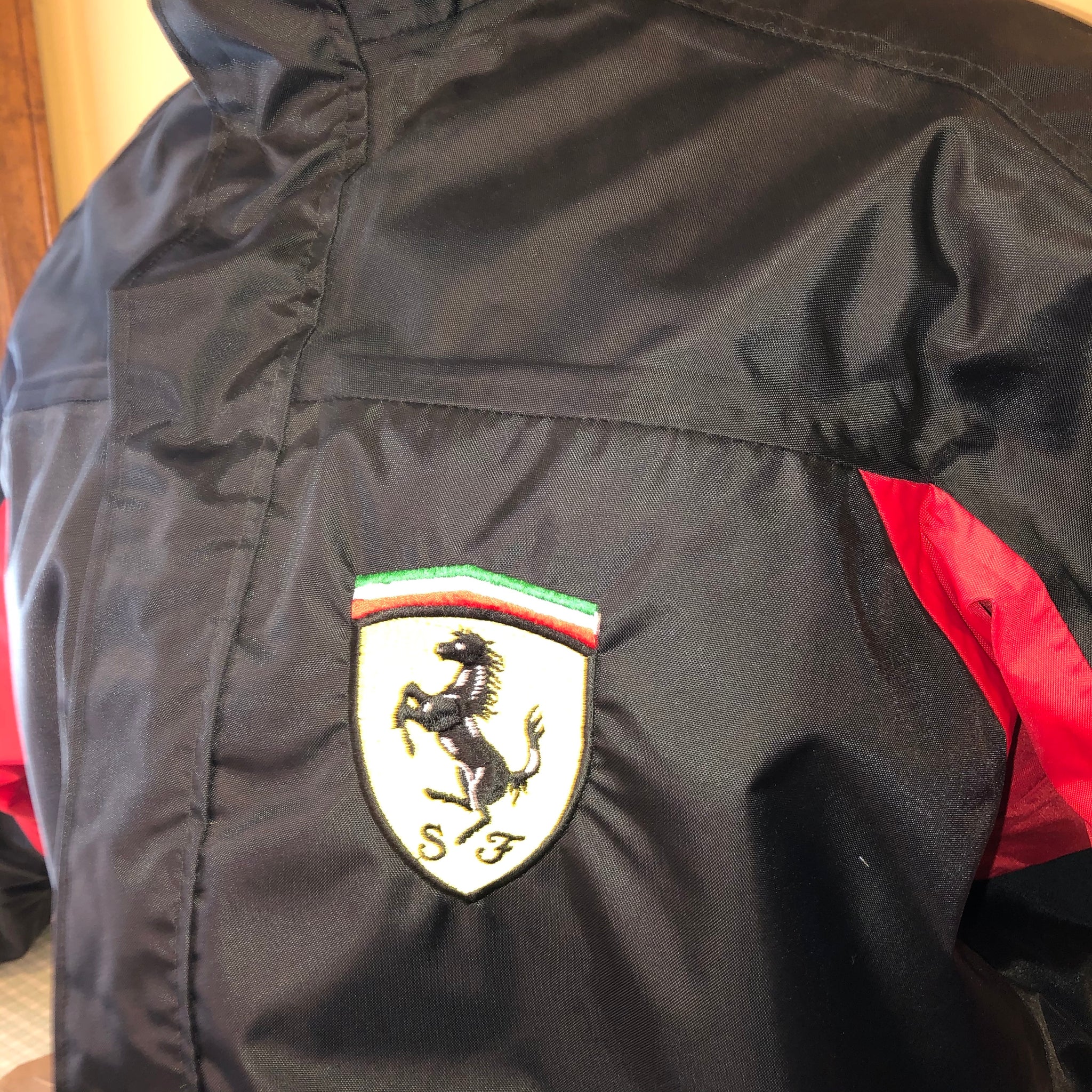 nice man sports ferrari jacket