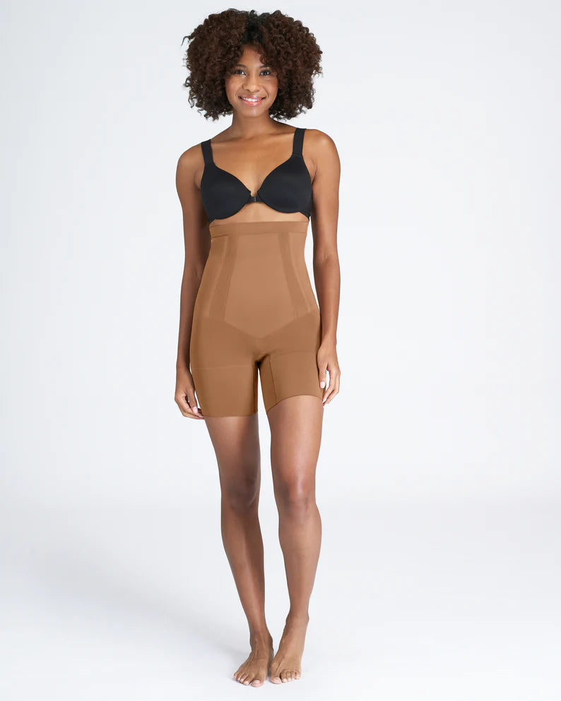 The Oncore Open-Bust Mid-Thigh Bodysuit By Spanx In Soft Nude - GINIA