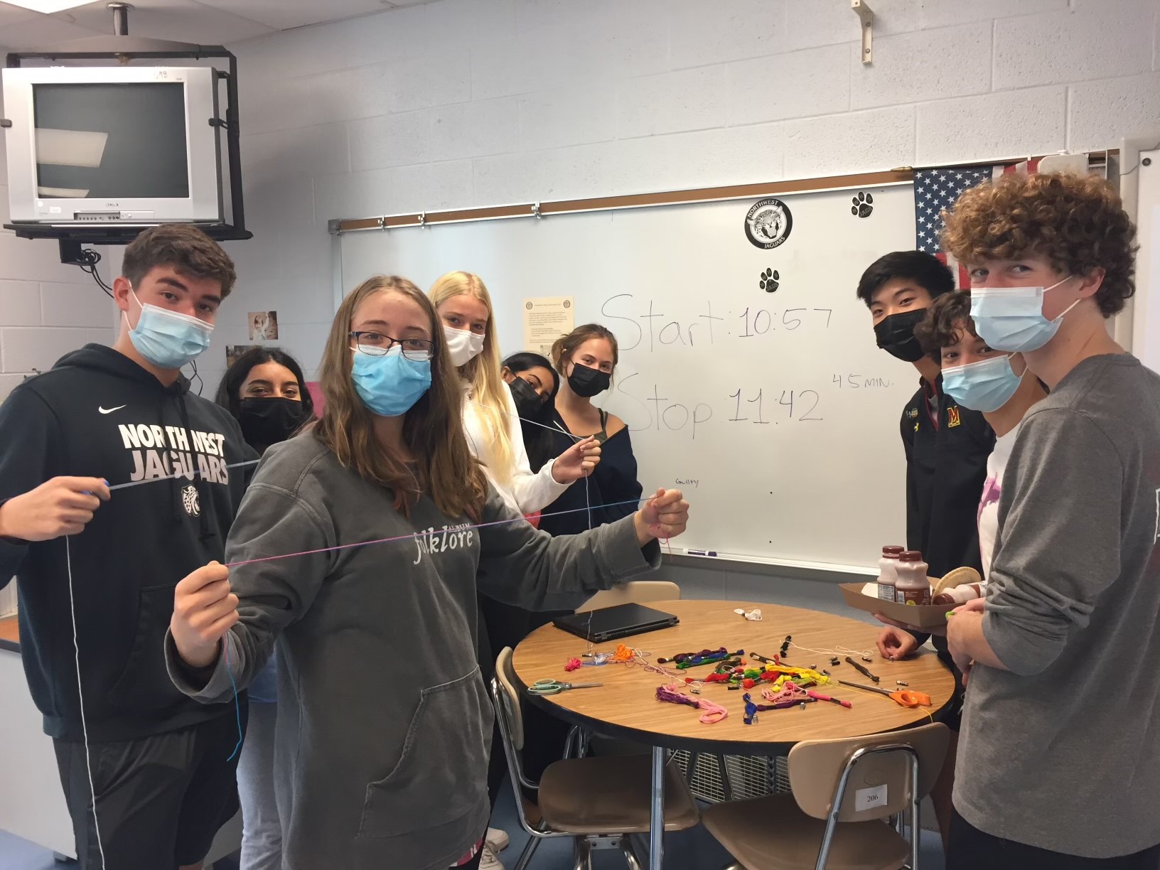 KTH Northwest members making friendship bracelets