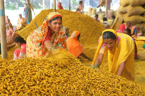 women in turmeric