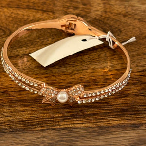 Rose Gold Hinge Bracelet with Bow and Pearl Center - CC’s Beauty Bar & Boutique LLC 