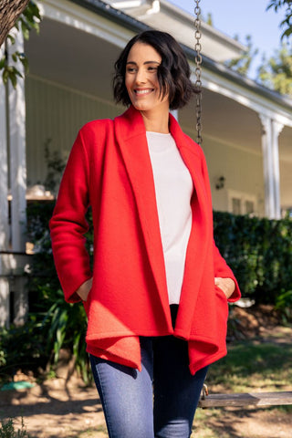 Women wearing bright red open drape wool jacket by Australian fashion label, See Saw