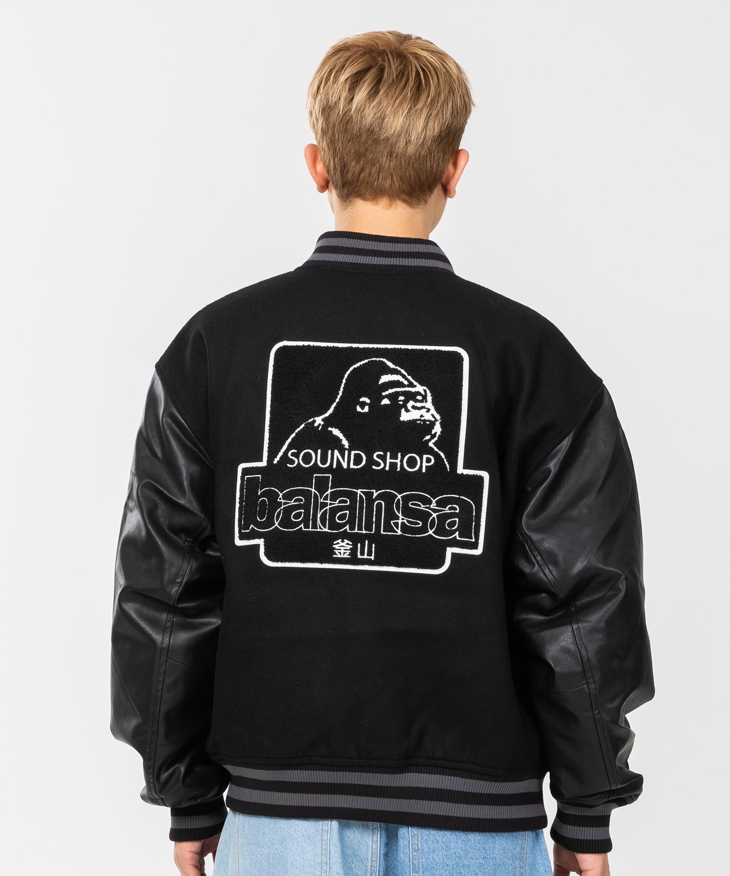 XLARGE × BALANSA STADIUM JACKET