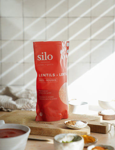 Photo of opened bag of Silo Red Lentils set in a bright kitchen, with natural sunlight streaming in