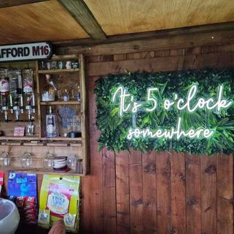 Shed Pub with plant wall and 