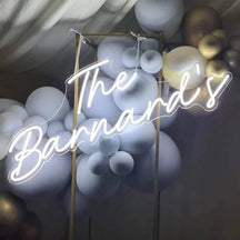 Snow white Surname Wedding Neon Sign and balloons.jpg__PID:1b299de6-832a-4624-89e8-fdd3794f1103