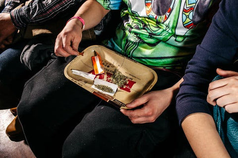 rolling up on a raw rolling tray