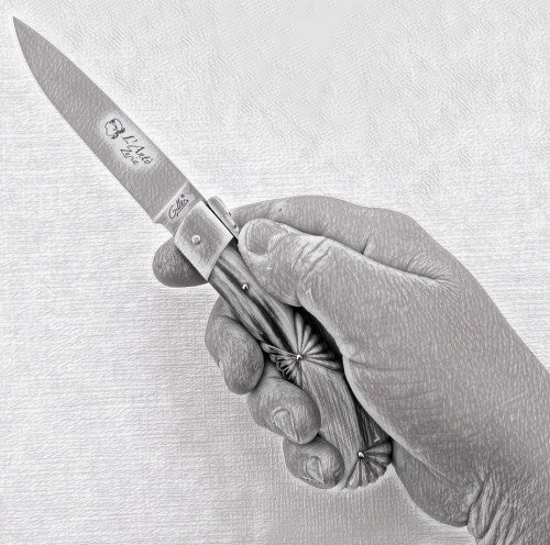 corsican anto knife shown in hand for size perception
