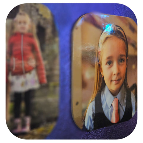 photo tiles with rounded corners on wall from a side