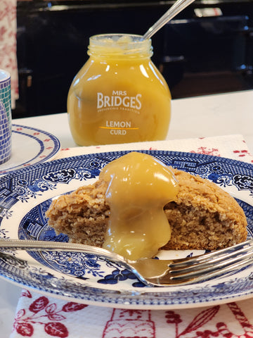 a gingerbread scone with lemon curd on top