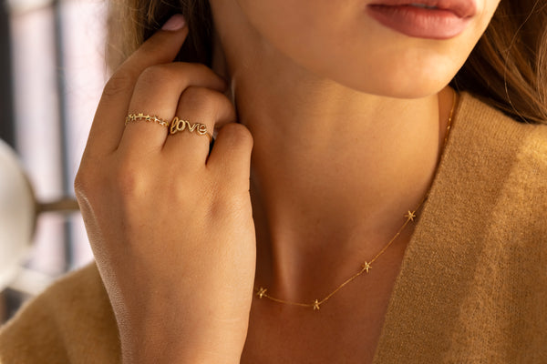model wearing 9ct yellow gold pieces
