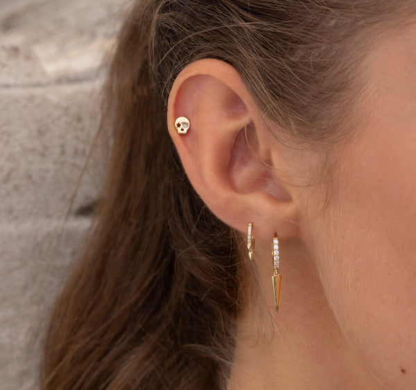 multiple ear piercings on model